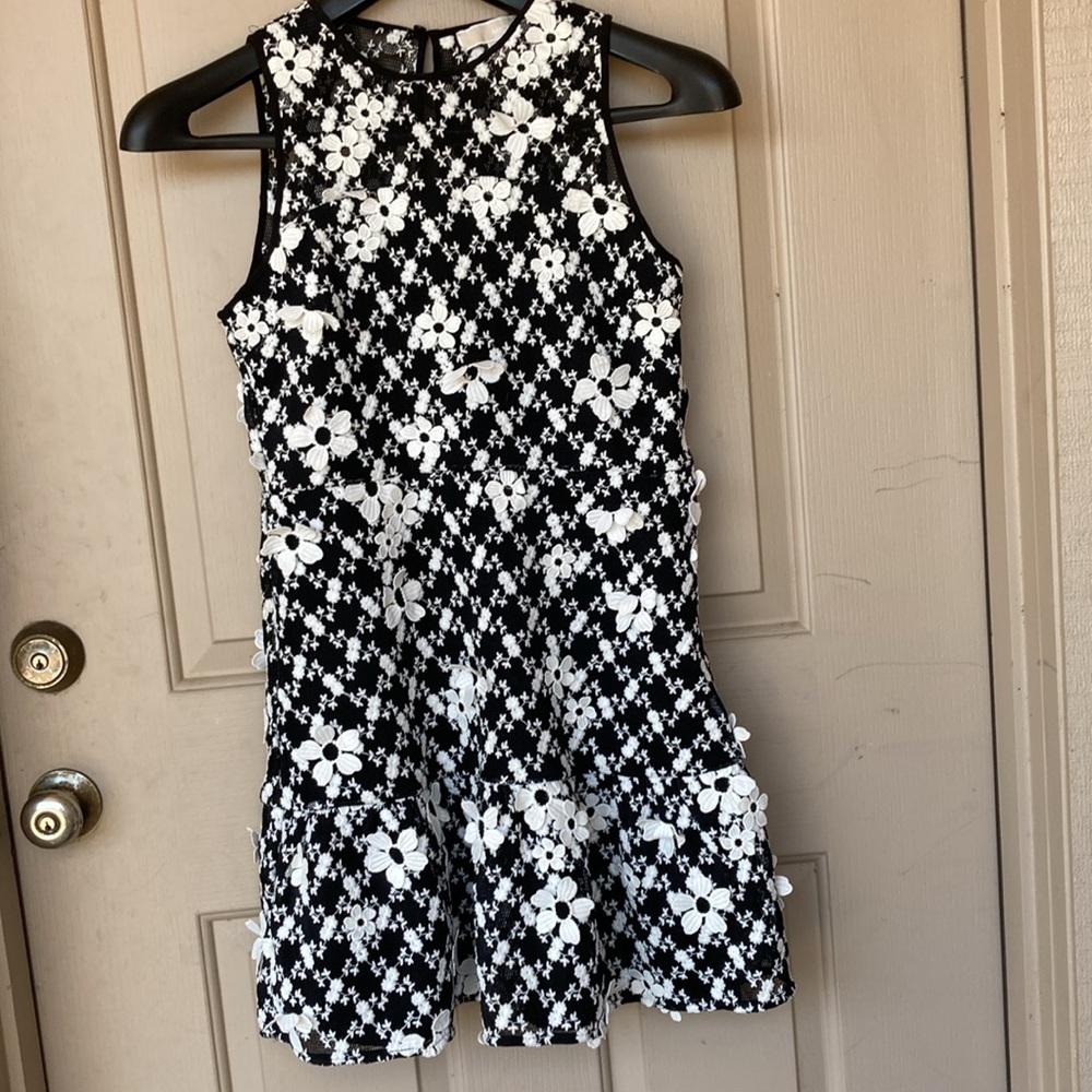 Michael Kors size 8 black, white floral  flowly  tight on top